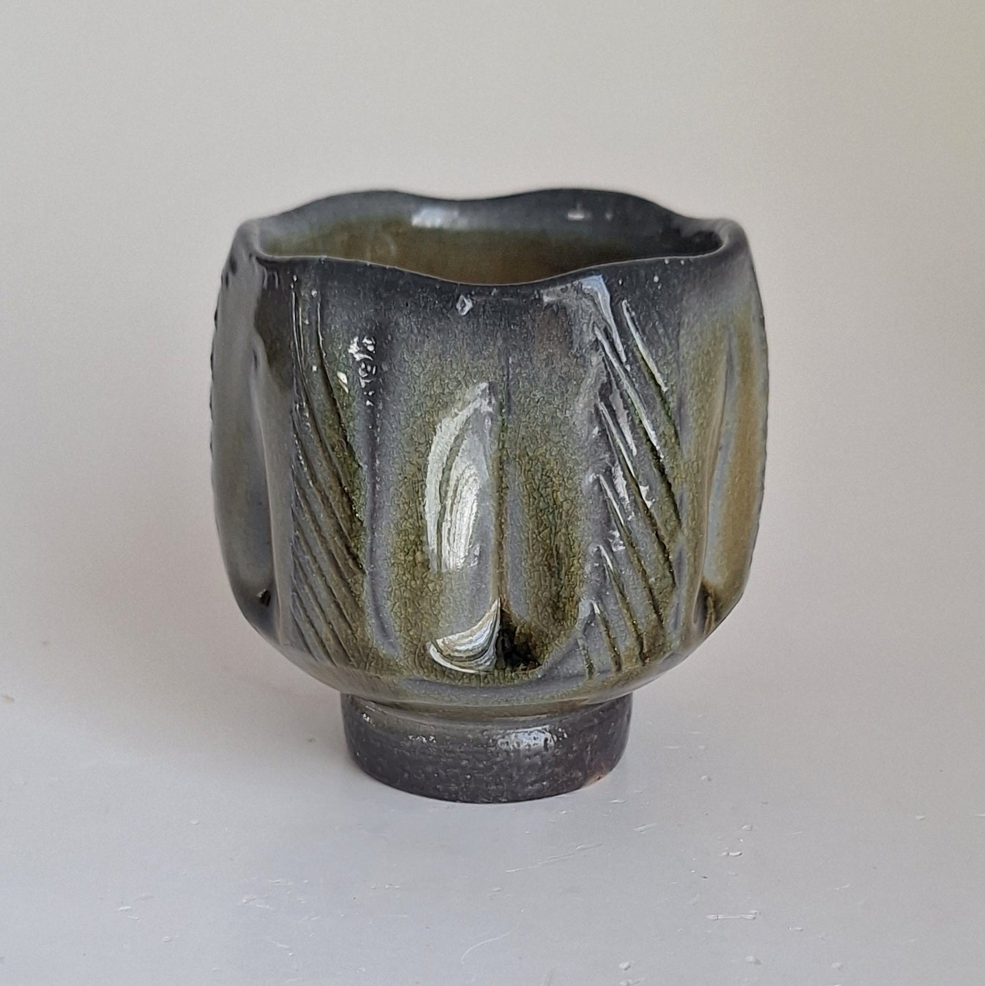 Faceted cup